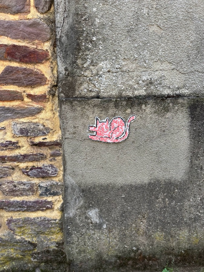 Mosaïque Chat sur un mur de pierre
